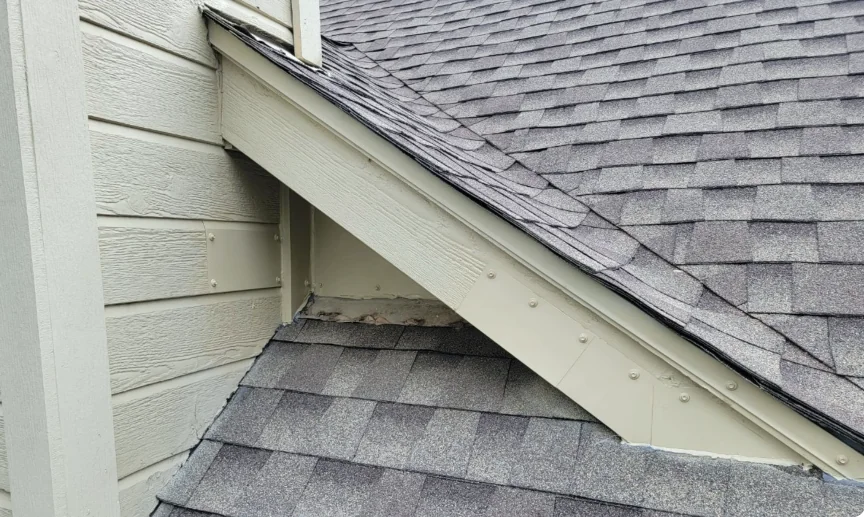 The same gable gap closed with metal and painted to match the trim
