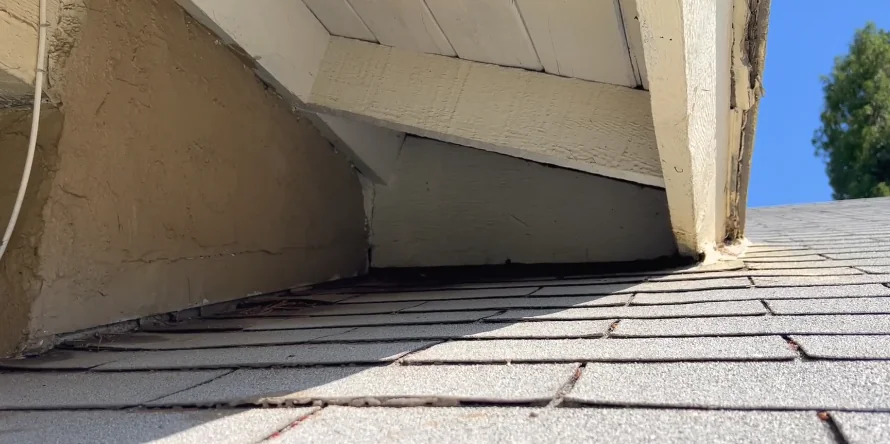 Gap along a roofline where a roof rat has been getting into the attic